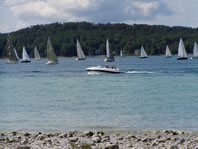 Sailboats and a boat